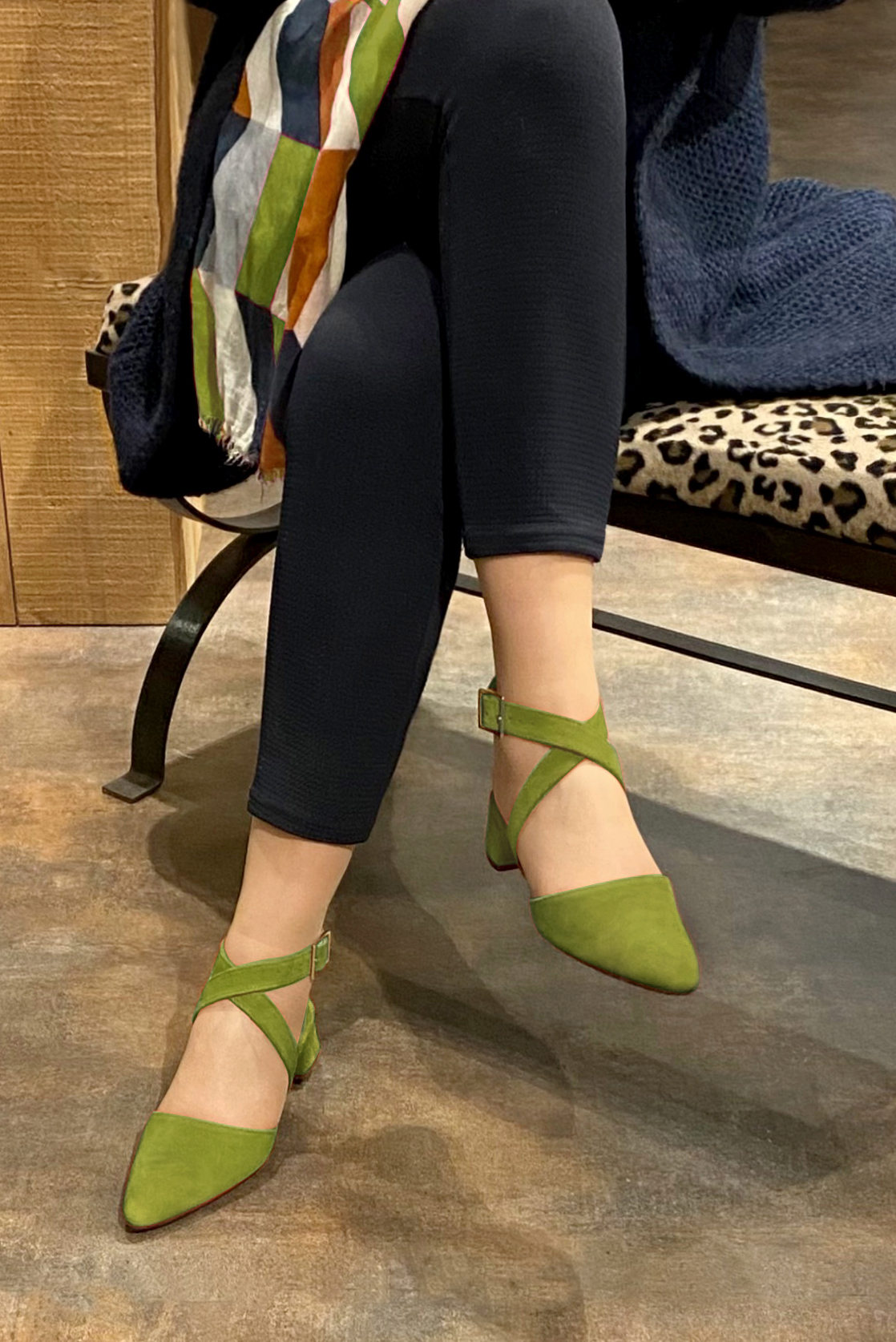 Pistachio green women's open back shoes, with crossed straps. Tapered toe. Low flare heels. Worn view - Florence KOOIJMAN